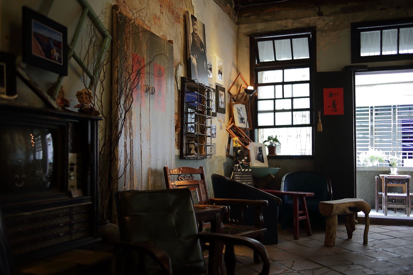 Airbnb living space before and after repainting in a warm greige — before