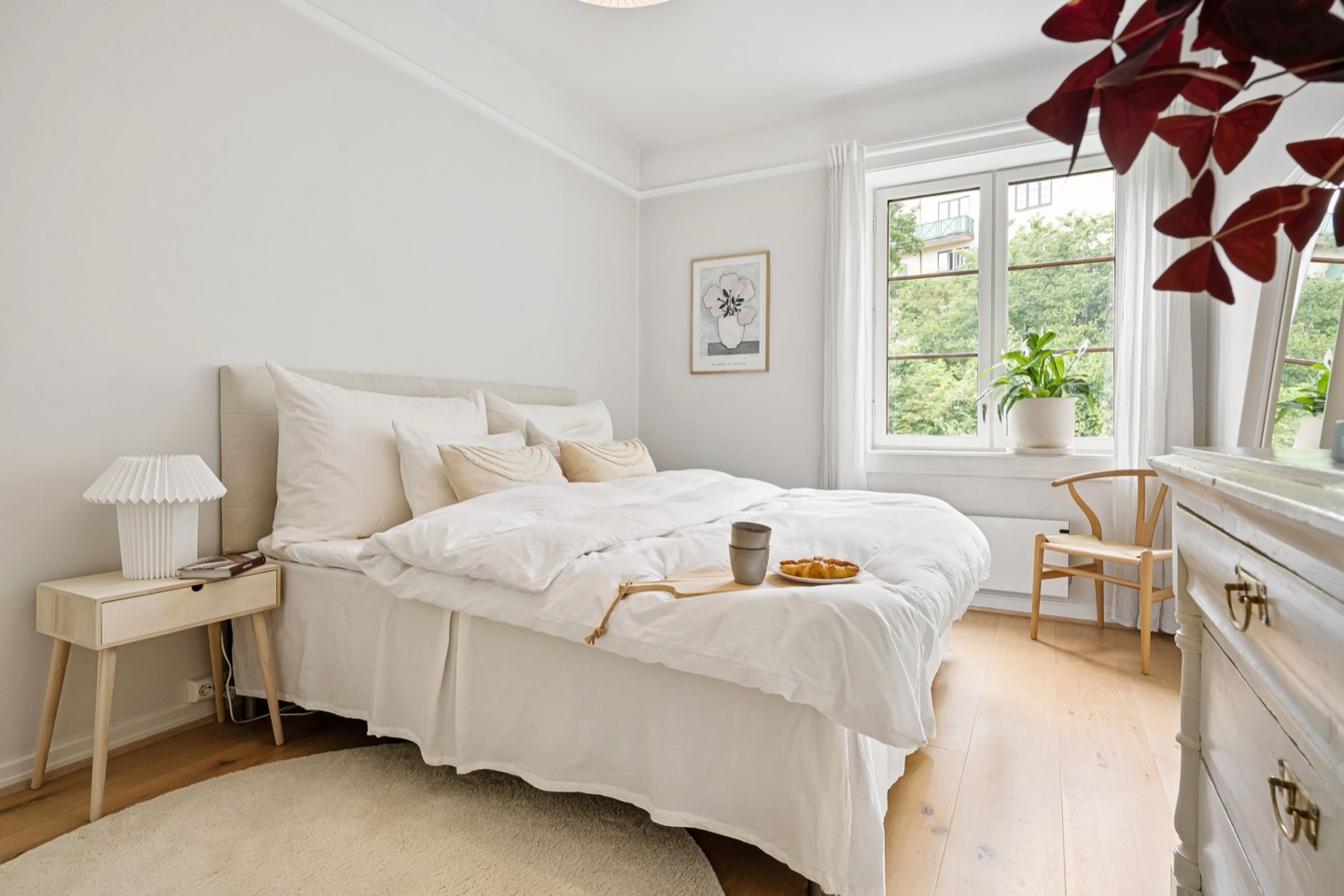Airbnb bedroom before and after in a booking-friendly furniture style — after, restyled by Restage