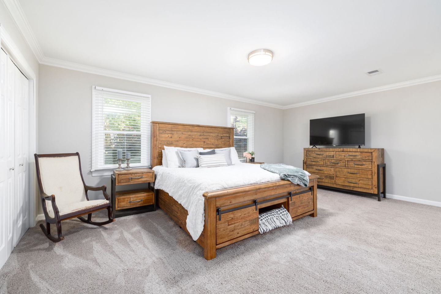 Airbnb room before and after furnishing to a set budget — after, restyled by Restage