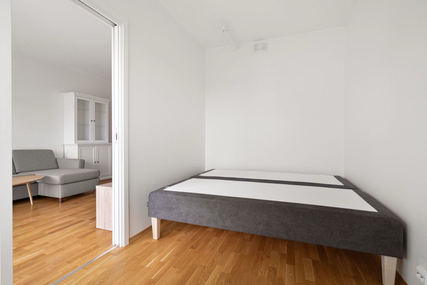 Airbnb room before and after furnishing to a set budget — before