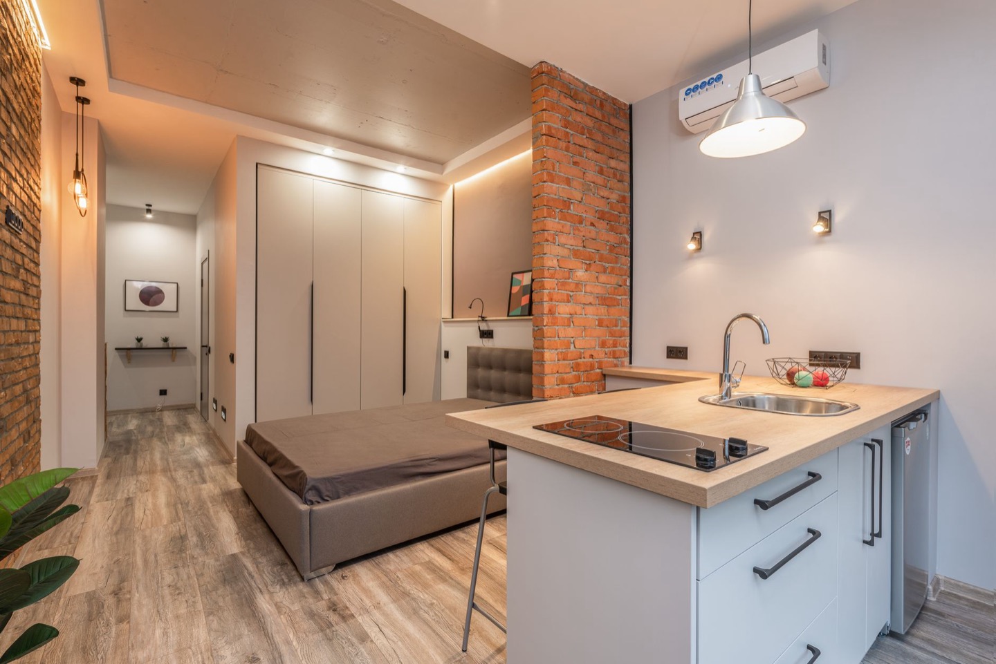 Small Airbnb studio before and after staging — before