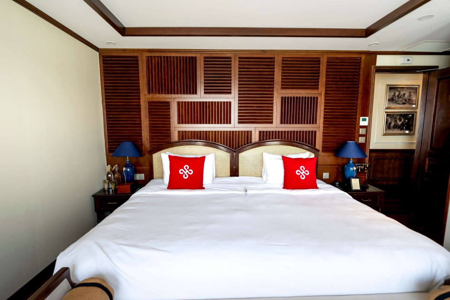 Airbnb bedroom before and after resizing the bed to fit the room — after, restyled by Restage