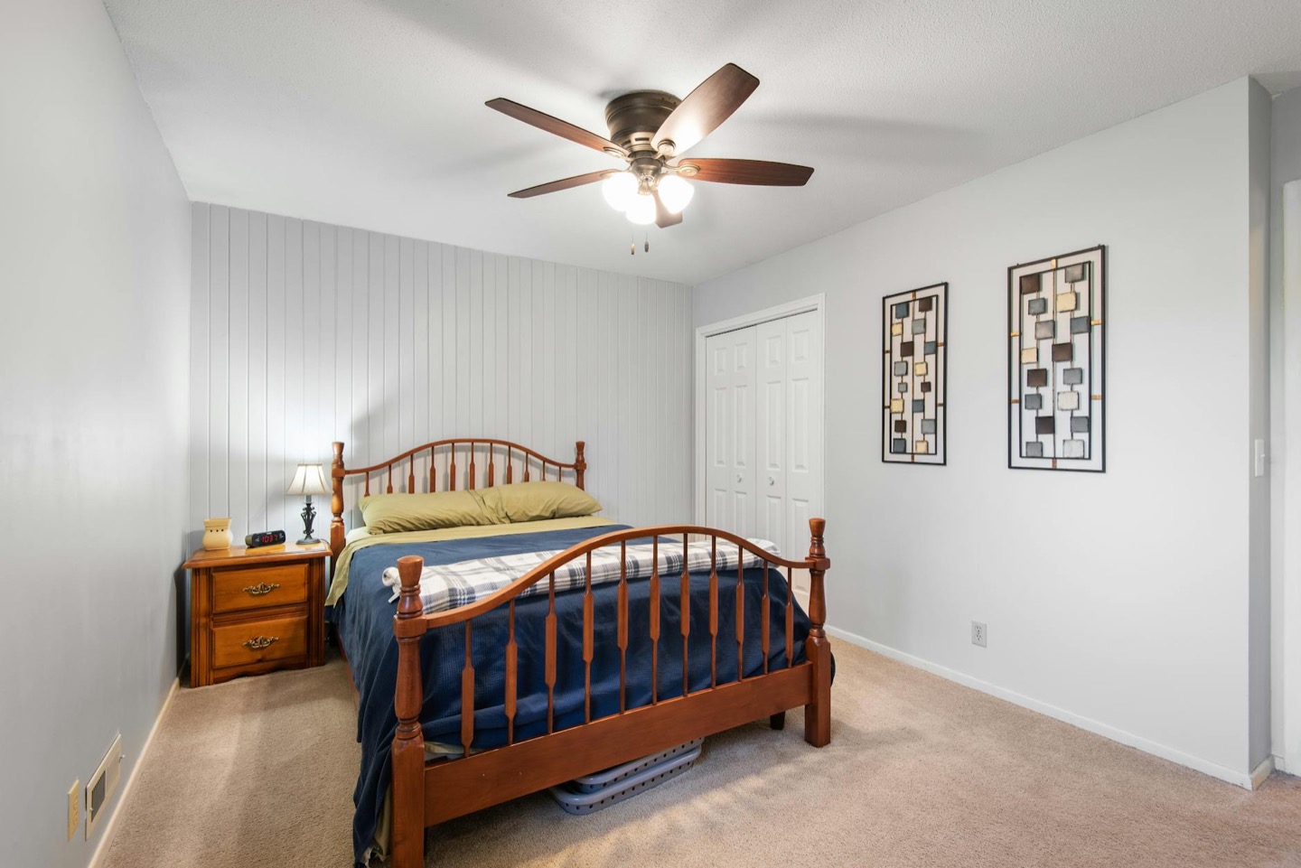 Airbnb bedroom before and after a tested wall color change — after, restyled by Restage