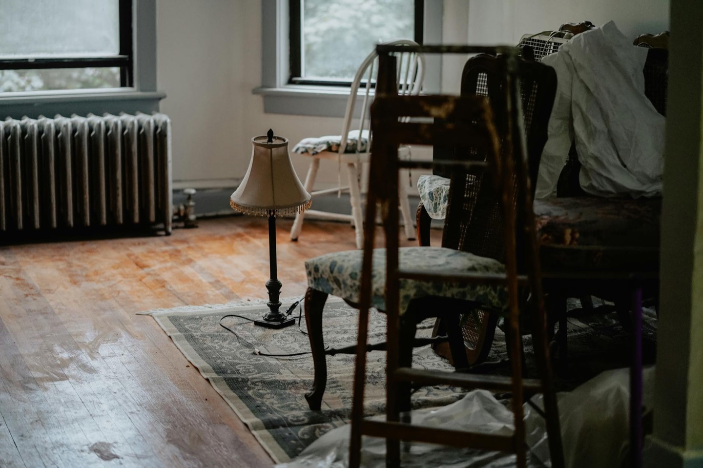Airbnb living room before and after warm minimal styling — before